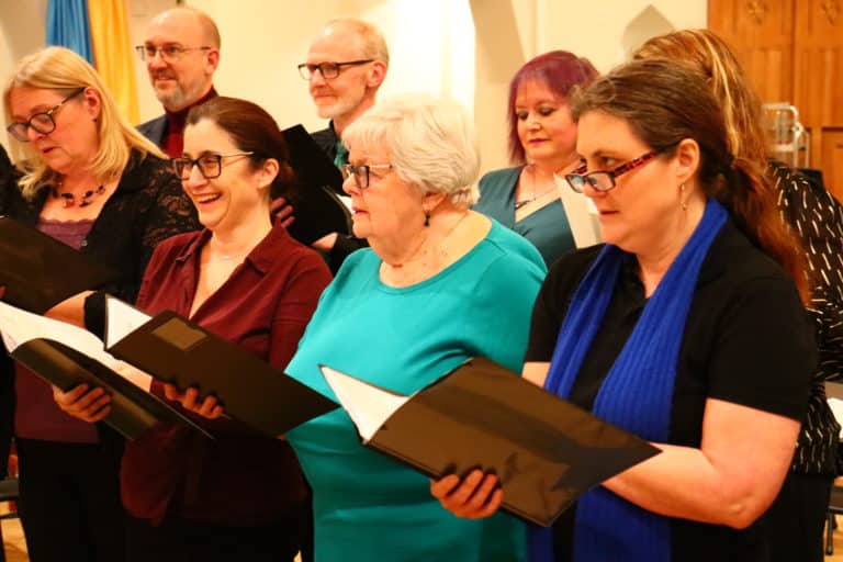 Adult choir performing in a church