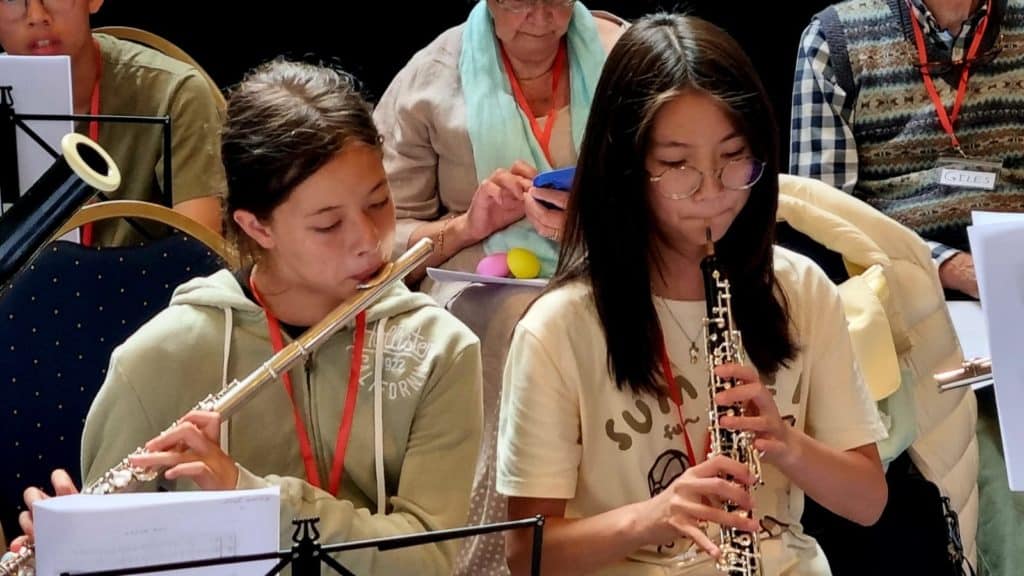 2 students playing flute