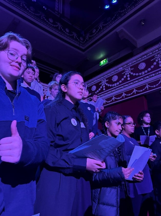 Group of senior choir students rehearsing at the Royal Albert Hall