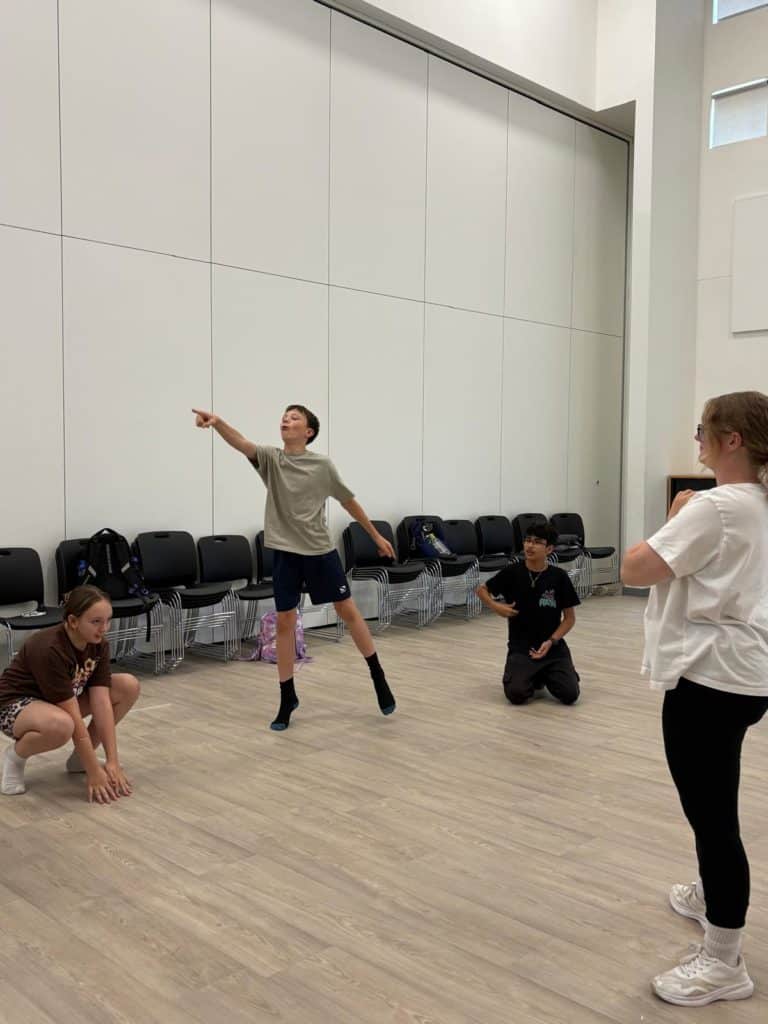 Male and female dancers creating poses
