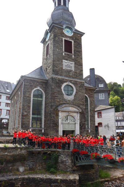 A stone building with a clock tower